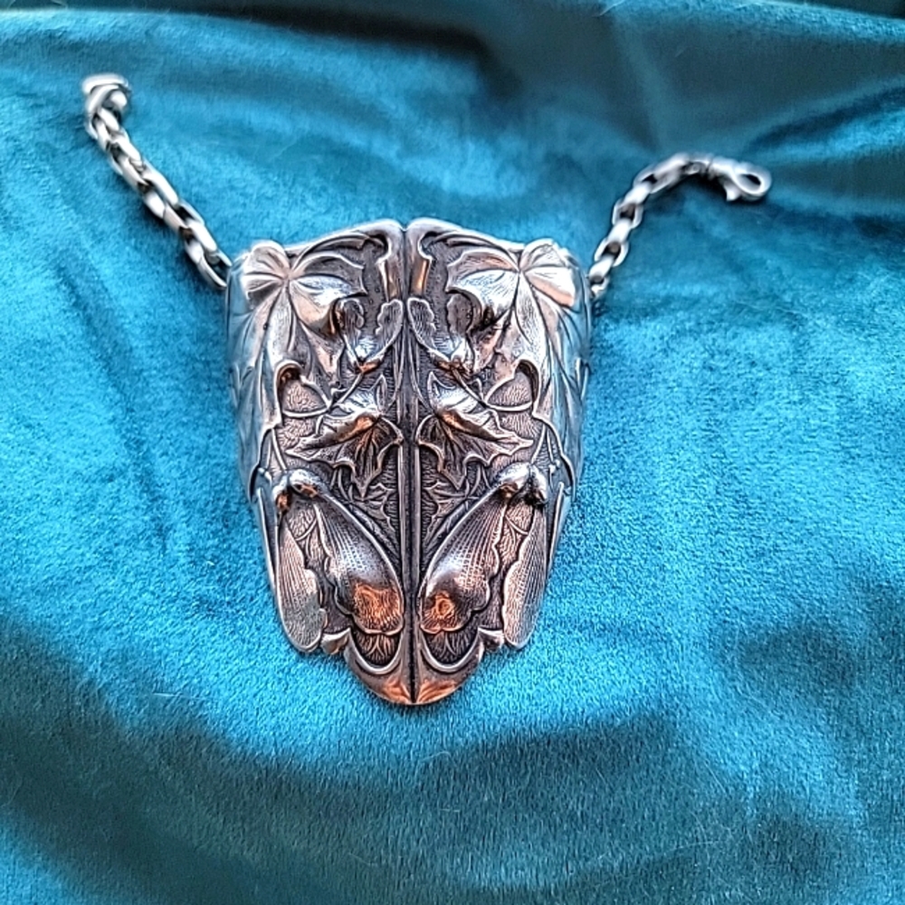 Ornate Nature-themed Silver Bracelet